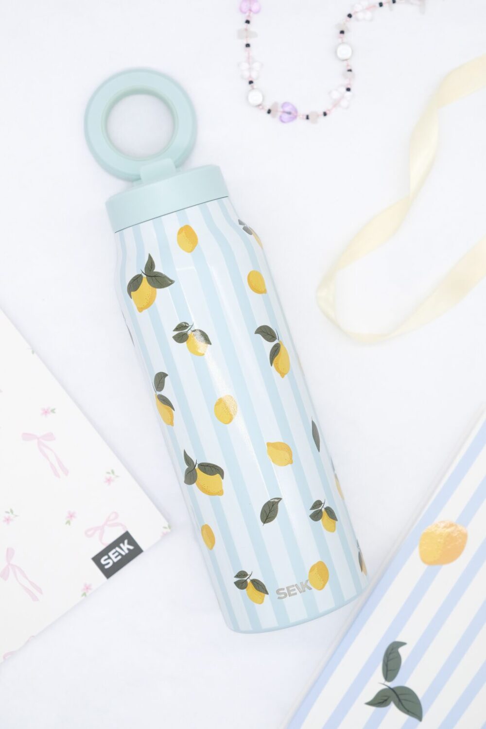 Duālās funkcijas (2-in-1) termopudele ar magnētisko tālruņa turētāju – Citroni (700ml)